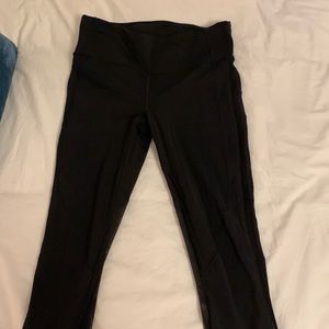 Lululemon size 8 leggings mesh detail in calf on back if leggings - black